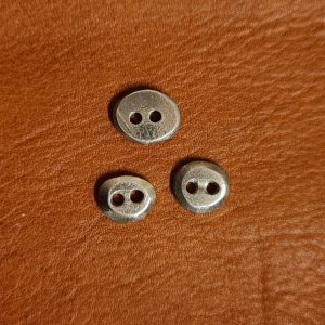 Knapper av tinn - ass. str.