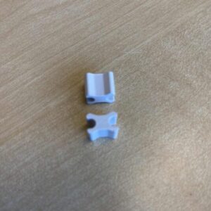 Bunnstopper byutterfly metall. Sort / Hvit.